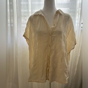 Yellow button down blouse